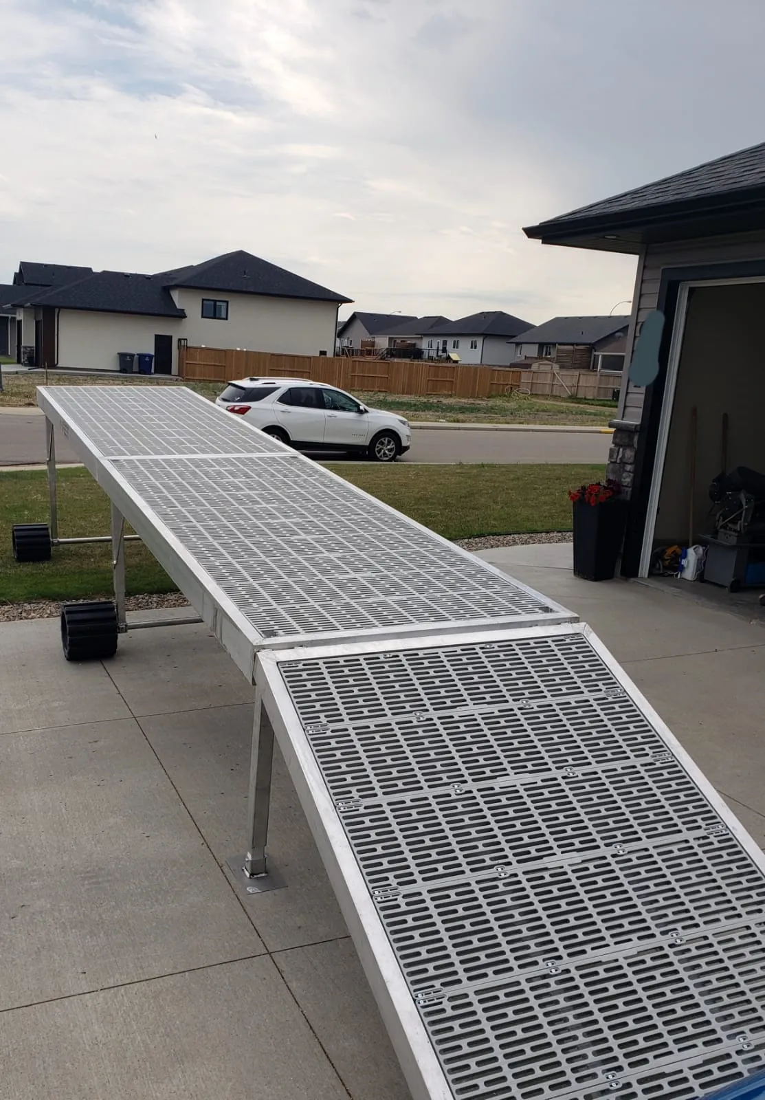 ThruFlow aluminum dock sections staged outside the Asquith workshop